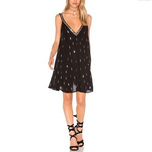 Free People Black dress with gold sequin.